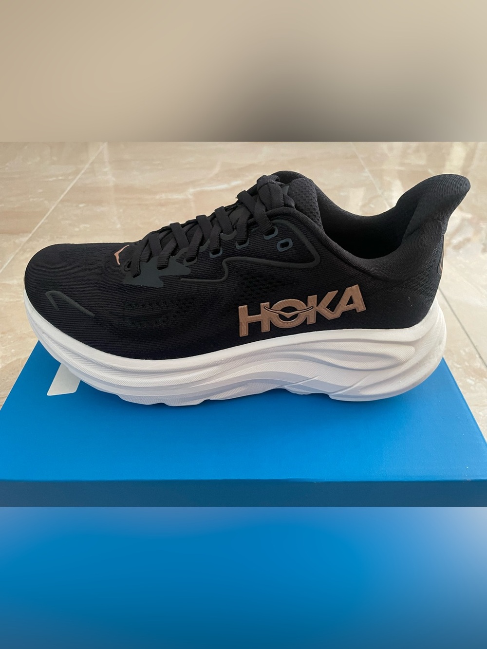 HOKA Women's Clifton 10 Running Shoe Black and Rose Gold